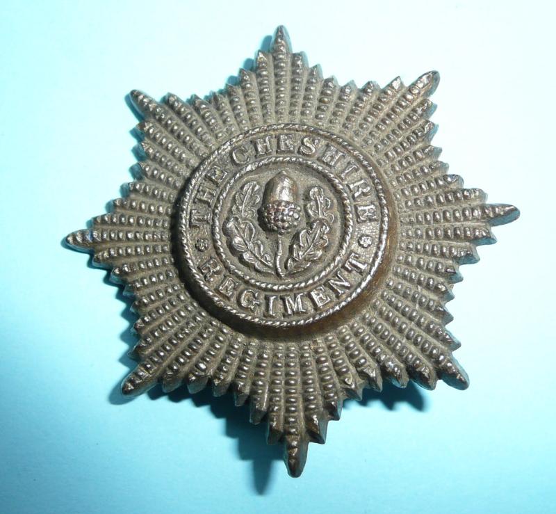 WW2 Cheshire Regiment Plastic Economy Cap Badge - Blades