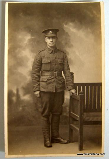 WW1 era original postcard - soldier of the Monmouthshire Regiment ( Territorials )