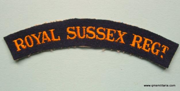 Scarce WW2 Royal Sussex Regiment Orange on Dark Blue Embroidered Cloth Shoulder Title