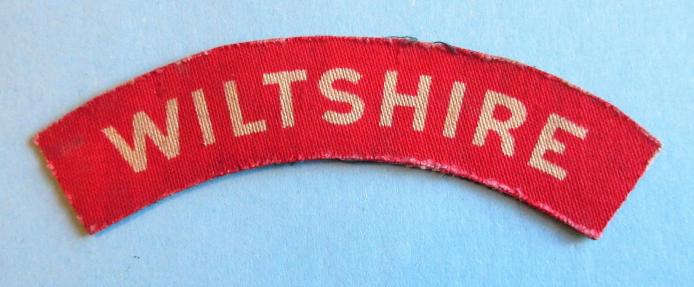 WW2 Wiltshire Regiment Printed White on Red Cloth Shoulder Title