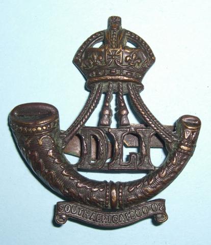 Durham Light Infantry ( DLI ) Territorial Officer 's Bronze OSD Cap Badge - South Africa Scroll