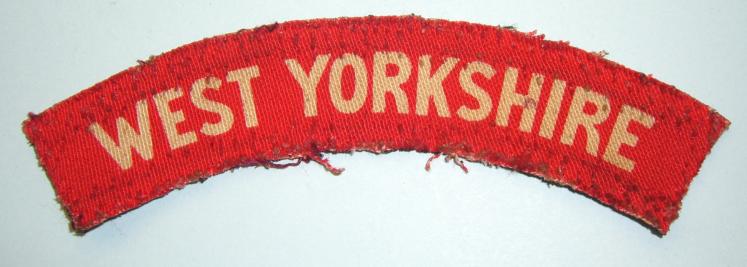 WW2 Printed West Yorkshire Regiment White on Red Cloth Shoulder Title