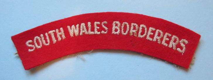 South Wales Borderers (SWB) Embroidered White on Red Felt Cloth Shoulder Title, worn from January 1944
