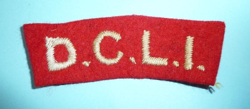 WW2 DCLI ( Duke of Cornwalls Light Infantry ) White on Red Felt Cloth Shoulder Title