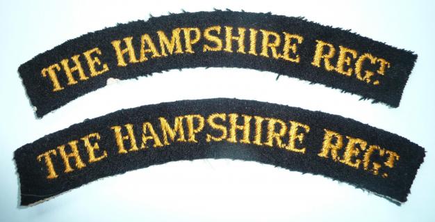 The Hampshire Regiment Matched Pair of Amber on Black Embroidered Cloth Shoulder Titles