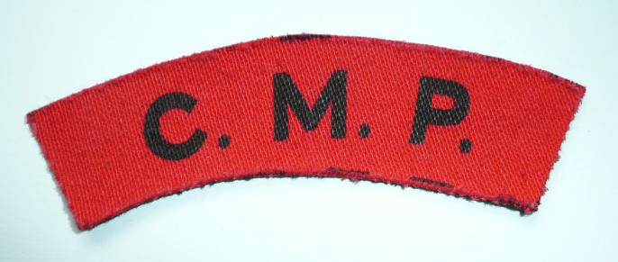 WW2 Printed CMP Corps of Military Police Black on Red Cloth Shoulder Title