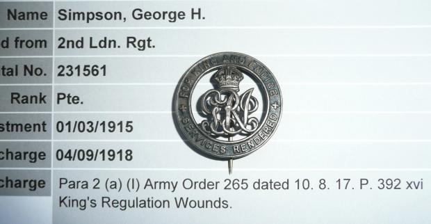 WW1 Silver War Badge (SWB) to George H Simpson, 2nd City of London Regiment (Royal Fusiliers) - Wounds
