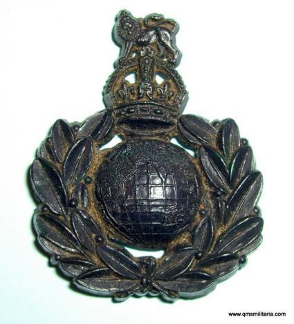 Scarce WW2 Royal Marines ( RM) dark blue economy plastic economy cap badge