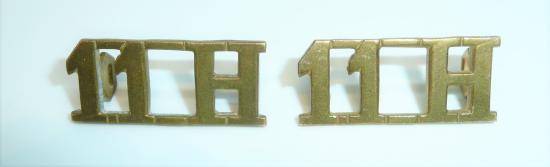 11th Hussars Pair of Brass Shoulder Titles