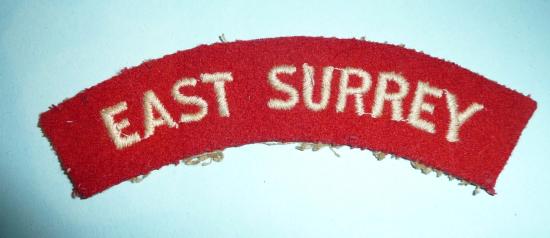 East Surrey Regiment White on Red Embroidered Cloth Shoulder Title