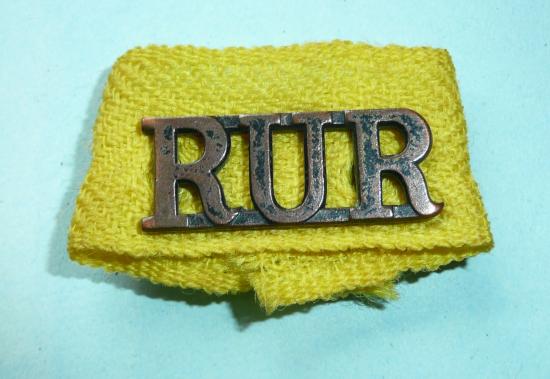 Royal Ulster Rifles (RUR) Blackened Brass Shoulder Title mounted on Yellow Colour Epaulette Ribbon Bar for 'C' Company