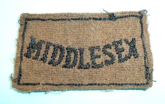 WW2 Middlesex Regiment Black on Khaki Shoulder Title Slip-on