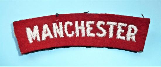 Manchester Regiment Woven White on Red Felt Shoulder Title