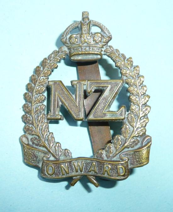 WW1 New Zealand Expeditionary Force Onward Cap Badge - British Section (oakleaf frame) In good condition with original slider
