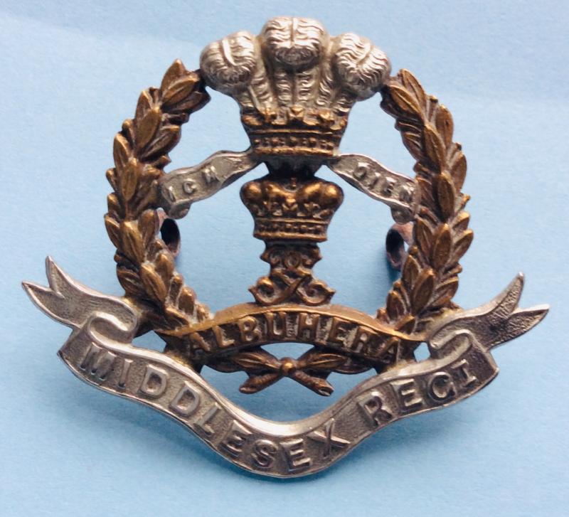 QVC / EDVII Middlesex Regiment Other Ranks Bi-metal Cap Badge