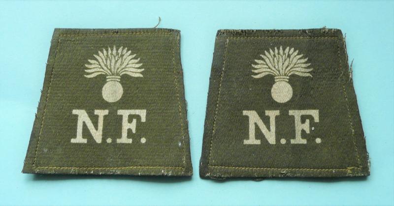 WW1 Northumberland Fusiliers Patched Pair of Cloth Shoulder Titles