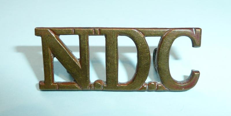 NDC (National Defence Company) Brass Shoulder Title