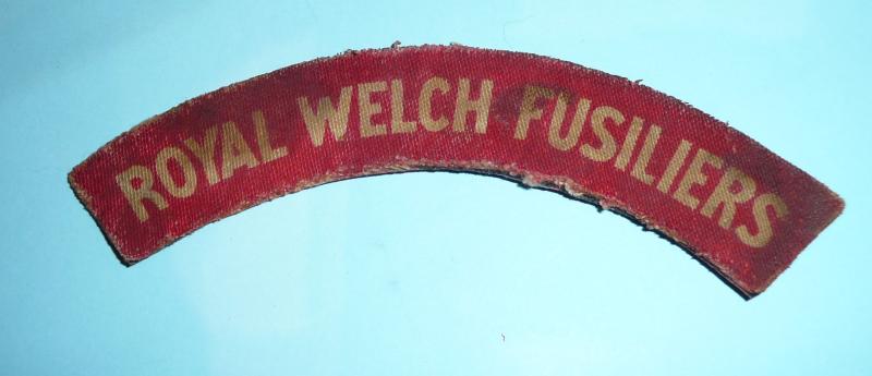 WW2 Royal Welch Fusiliers Printed White on Red Cloth Shoulder Title