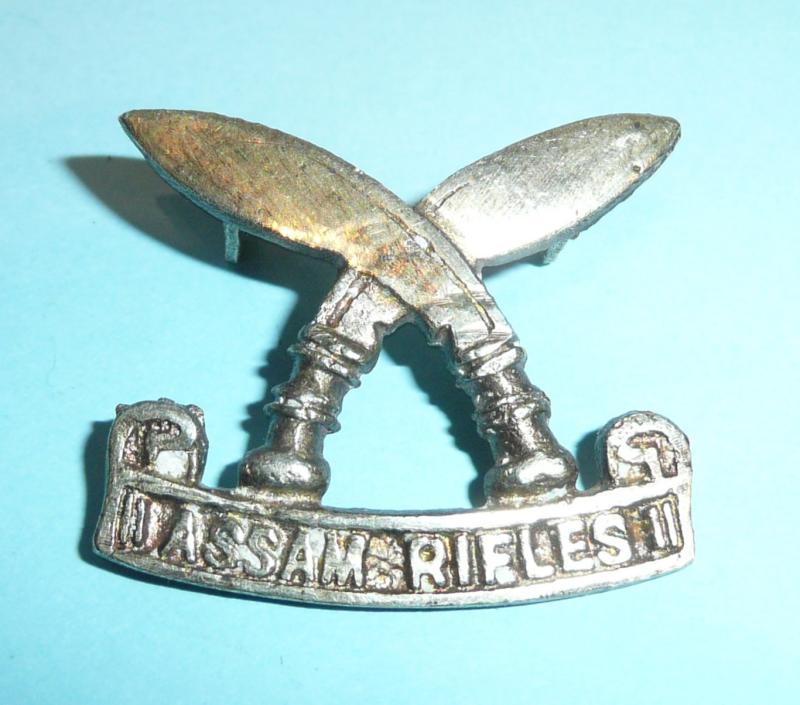 Indian Army - Assam Rifles White Metal Cap Badge