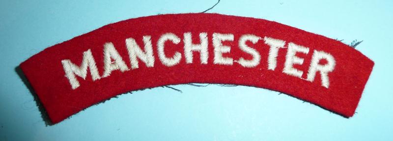 The Manchester Regiment Woven White on Red Felt Shoulder Title