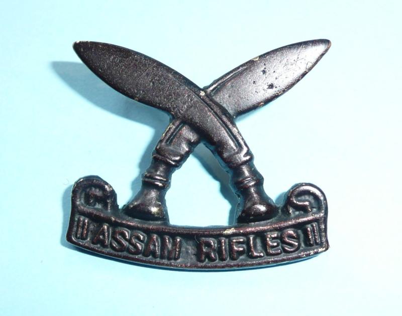 Indian Army - Assam Rifles Blackened Brass Cap Badge