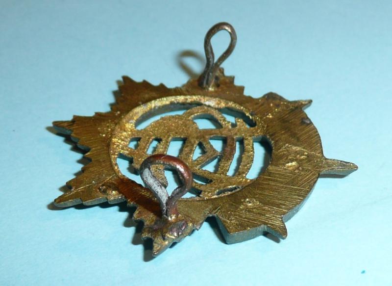 WW2 East African Army Service Corps Sand iCast Brass Cap Badge