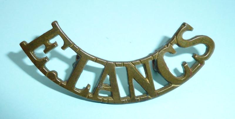 E LANCS - East Lancashire Regiment Brass Shoulder Title - variant