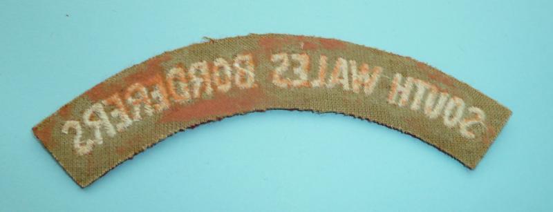 South Wales Borderers (SWB) White on Red Woven Enbroidered Felt Cloth Shoulder Title