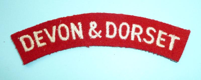 Devon & Dorset Regiment White on Red Woven Enbroidered Felt Cloth Shoulder Title